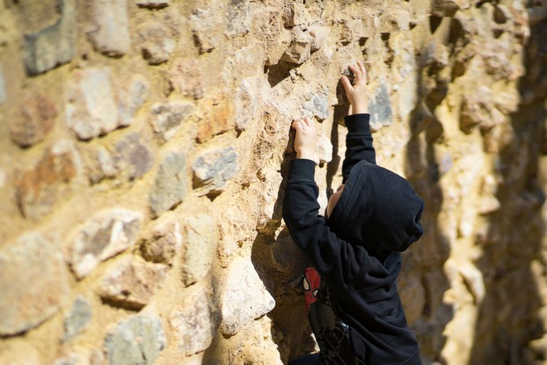 Child climbing wall